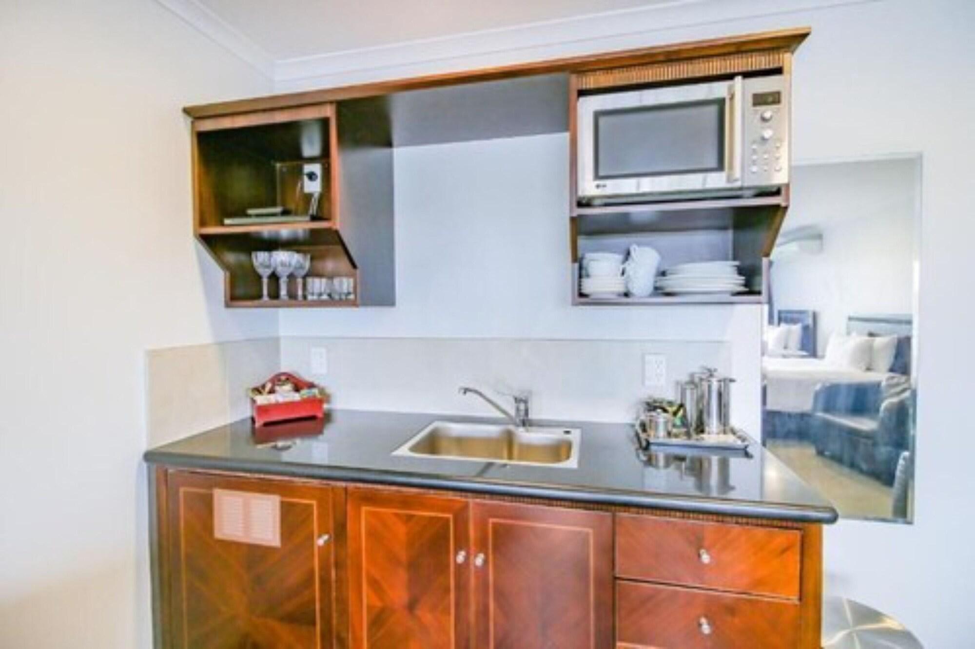 Aotea Motor Lodge Whanganui Exterior photo A kitchenette in a hotel room